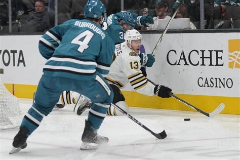 Bruins beat the winless Sharks 3-1 for their 3rd straight win to open the season